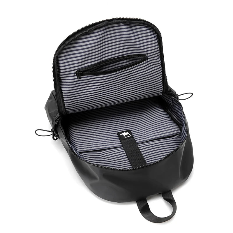 Black water-resistant laptop backpack interior compartment | Atlantis