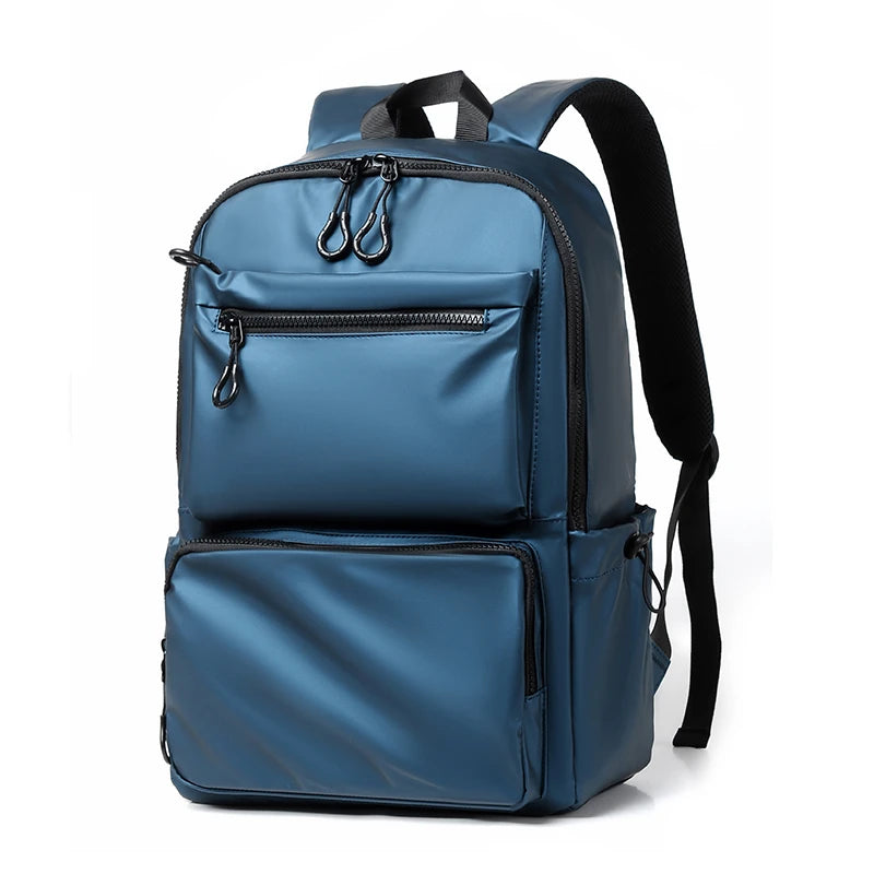 Blue waterproof laptop backpack — angled front view with padded straps from Atlantis