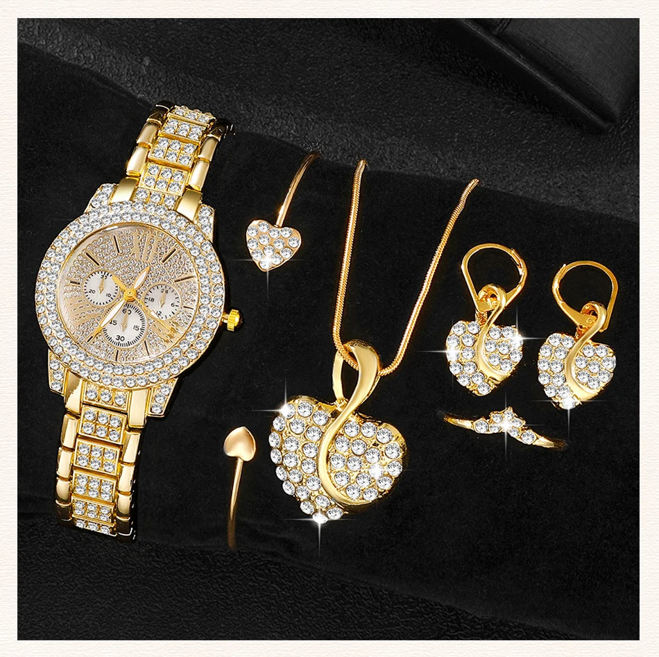 Gold jewelry set including a watch, necklace, and earrings on a Black background