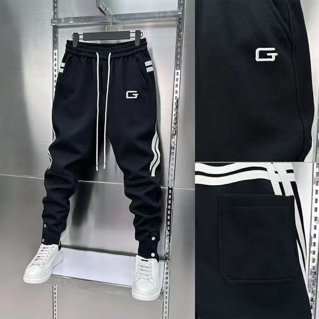Black Men's EmbroideRed Jogger Pants – Side Profile & Splicing Detail | Atlantis
