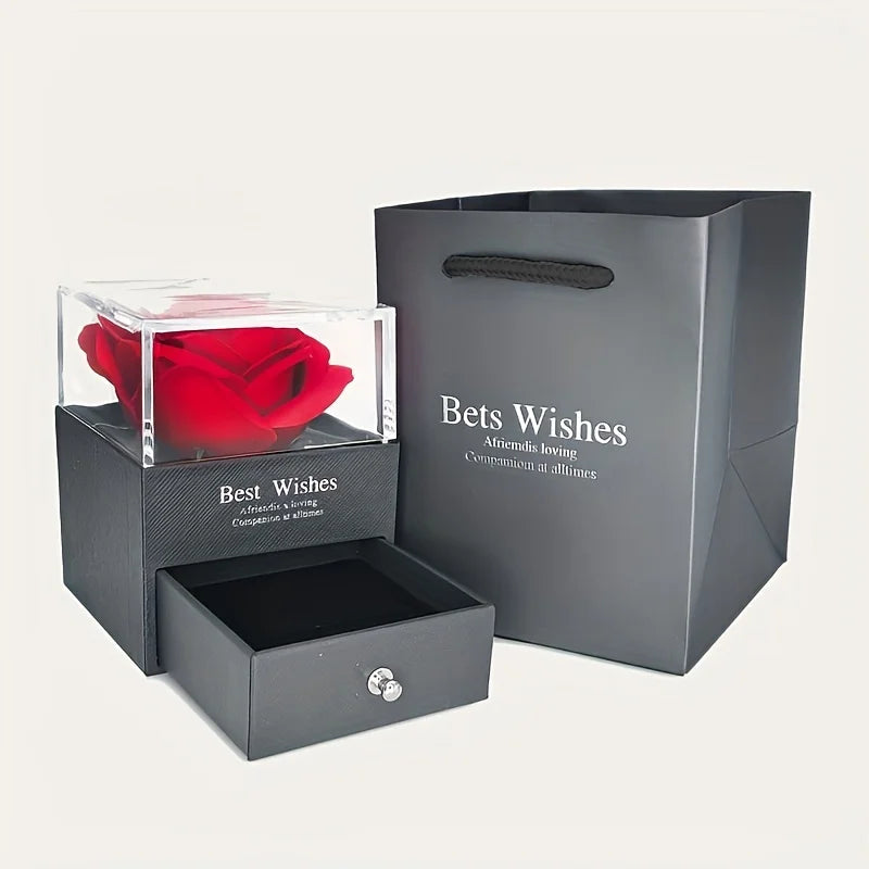 Gray gift box with a Red rose inside on a light Gray background