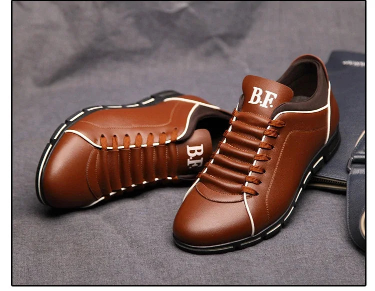 Brown leather shoes with 'BF' branding on a Gray surface