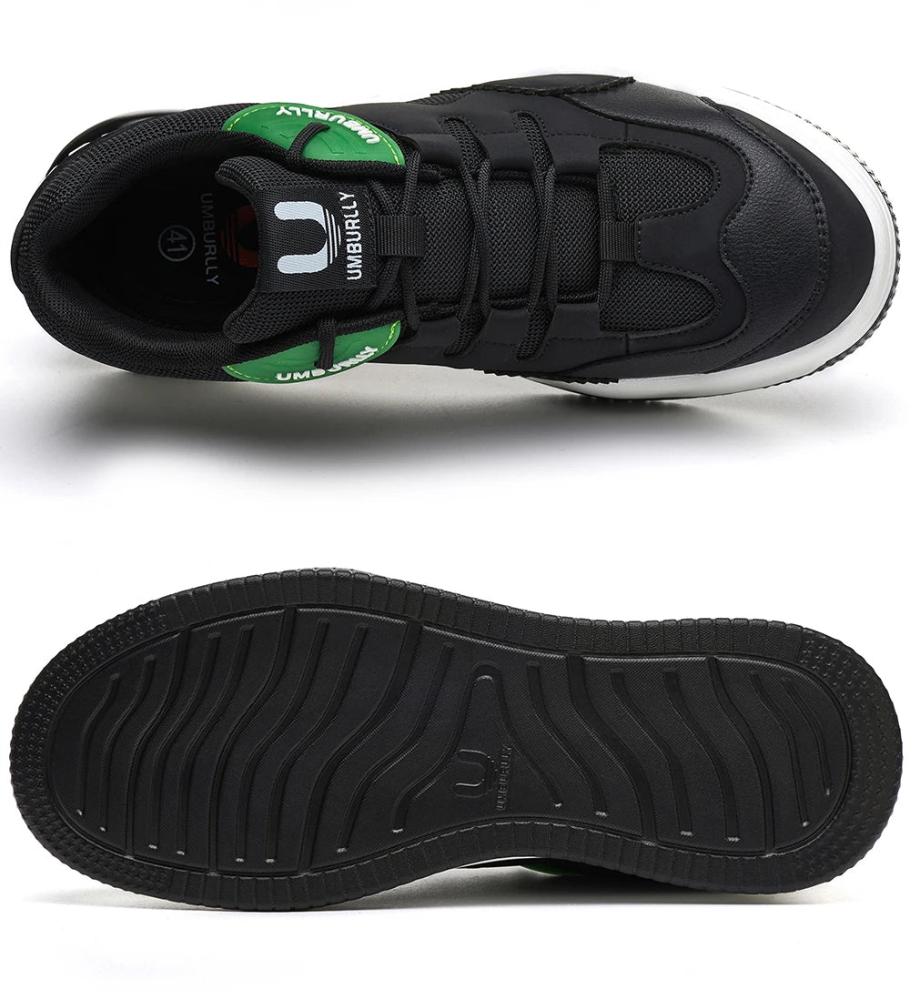 Black sneaker with Green accents and 'Umbro' branding on a White background