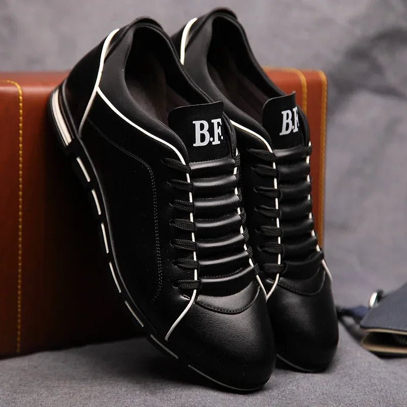 Black sneakers with White accents on a Gray background