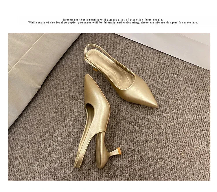 Gold high-heeled shoes on a textuRed surface with text overlay.
