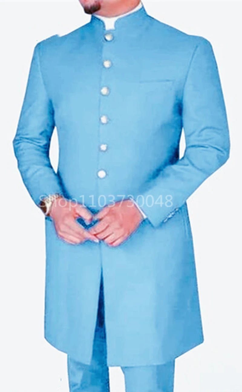 Man wearing a light Blue sherwani with a White shirt underneath.