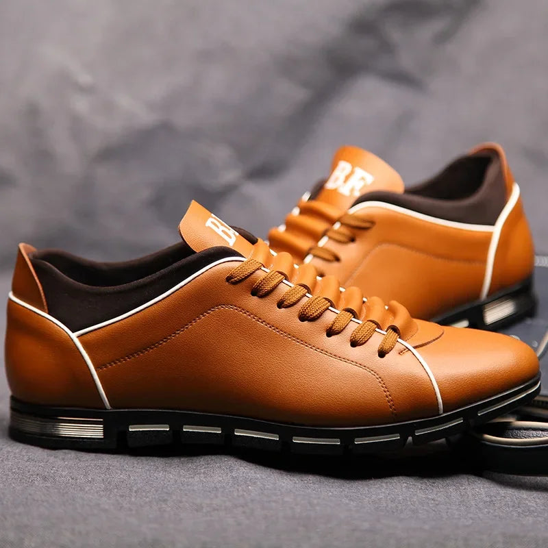 Brown leather shoes with Black soles on a Gray background