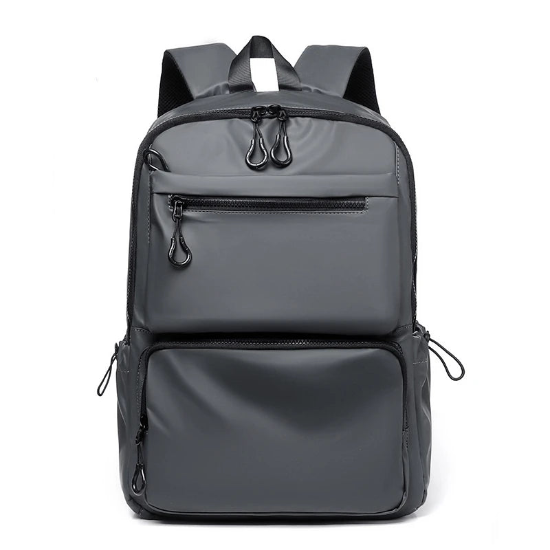 Gray waterproof laptop backpack — front view with dual compartments from Atlantis