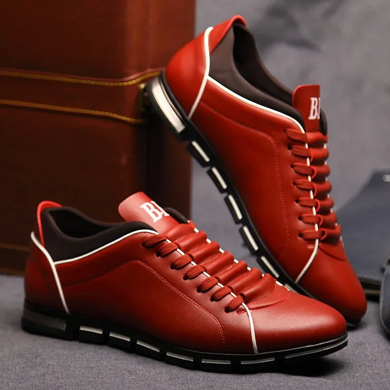 Red sneakers with White accents on a Gray surface