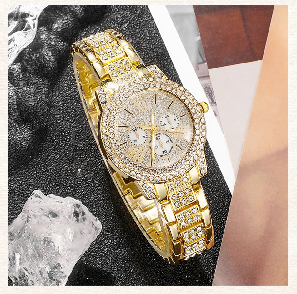 Gold wristwatch with diamond accents on a textuRed surface