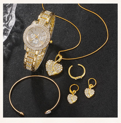 Gold jewelry set including a watch, necklace, bracelet, and earrings on a Black background