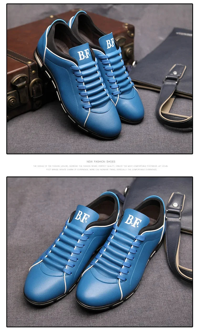 Blue casual shoes with 'BF' branding on a Gray surface with a briefcase and bag in the background.