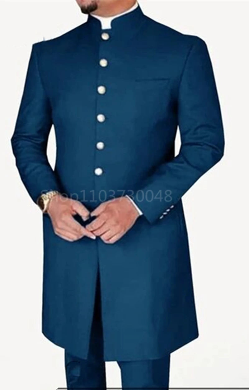 Blue traditional outfit with White buttons on a plain background