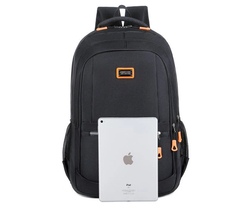 Black backpack with orange accents holding an iPad on a White background