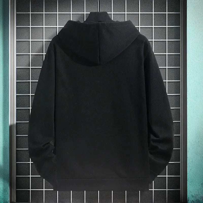 Black hoodie on a tiled wall background