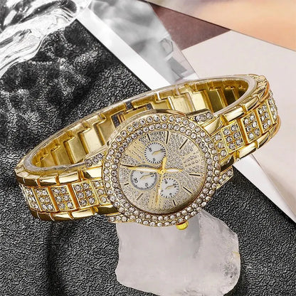 Gold wristwatch with diamond accents on a dark surface