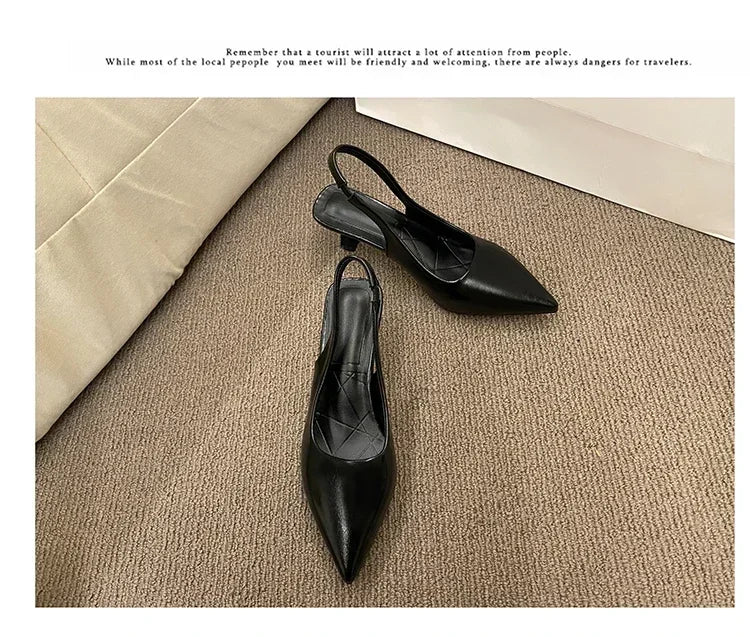 Black high-heeled shoes on a textuRed surface with text overlay.