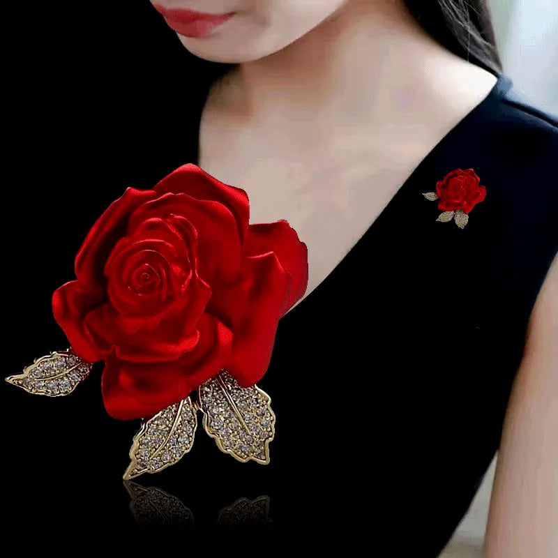 Red rose brooch on a Black background