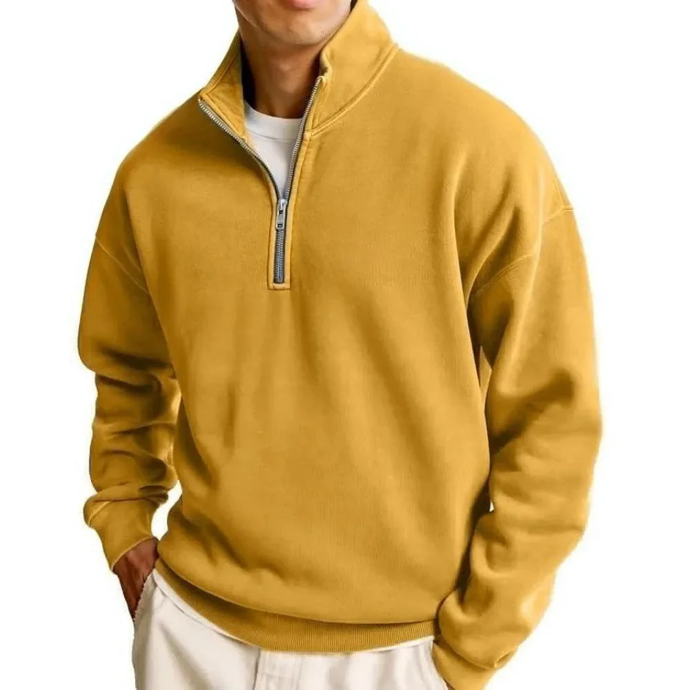 Yellow pullover with a quarter zip on a white background