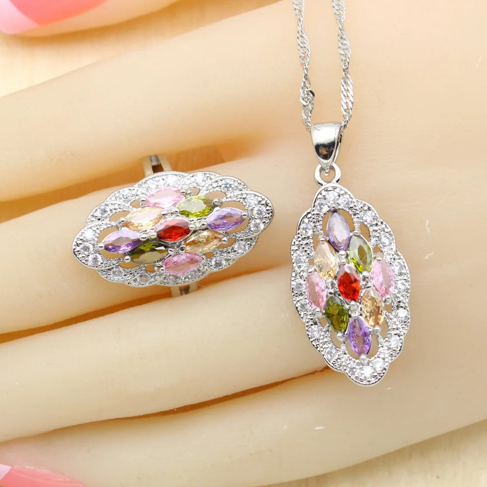MulticoloRed gemstone necklace on a person's hand