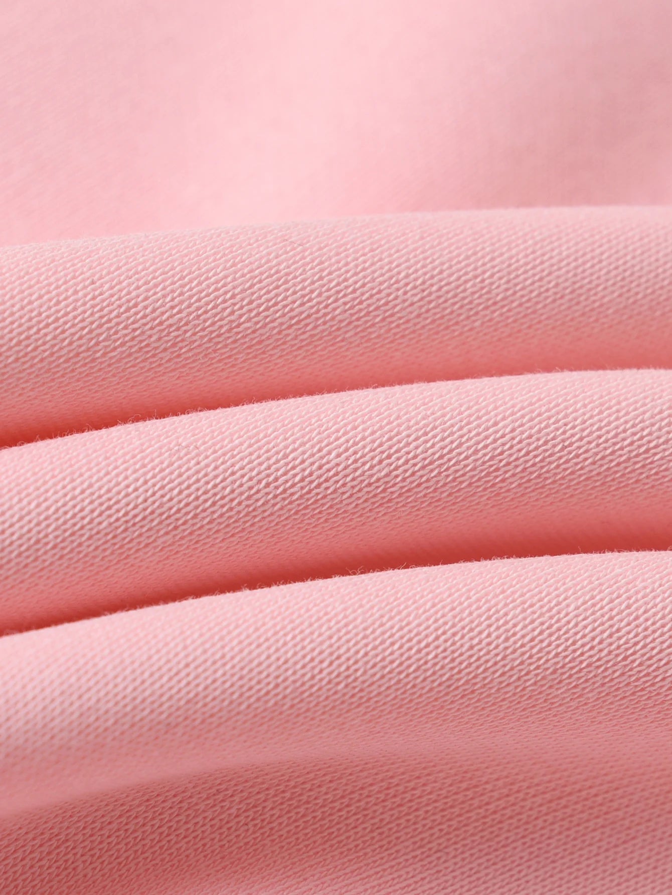 Close-up of Pink fabric with a soft texture