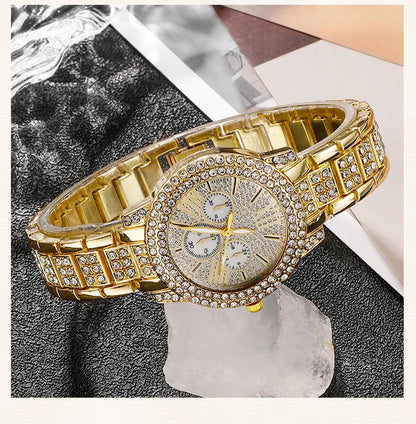 Gold wristwatch with diamond-studded face on a textuRed surface