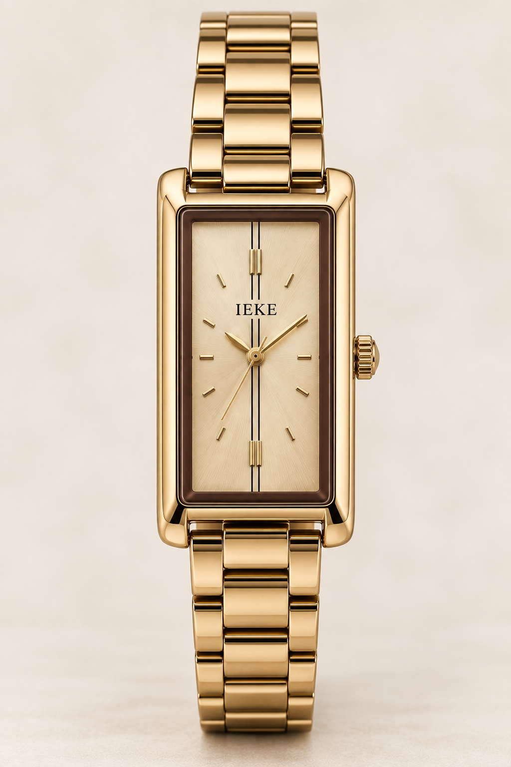 Women's rectangular gold IEKE watch front view on cream background